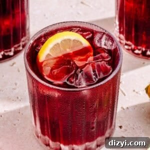 Tinto de Verano in a glass with lemon slice.