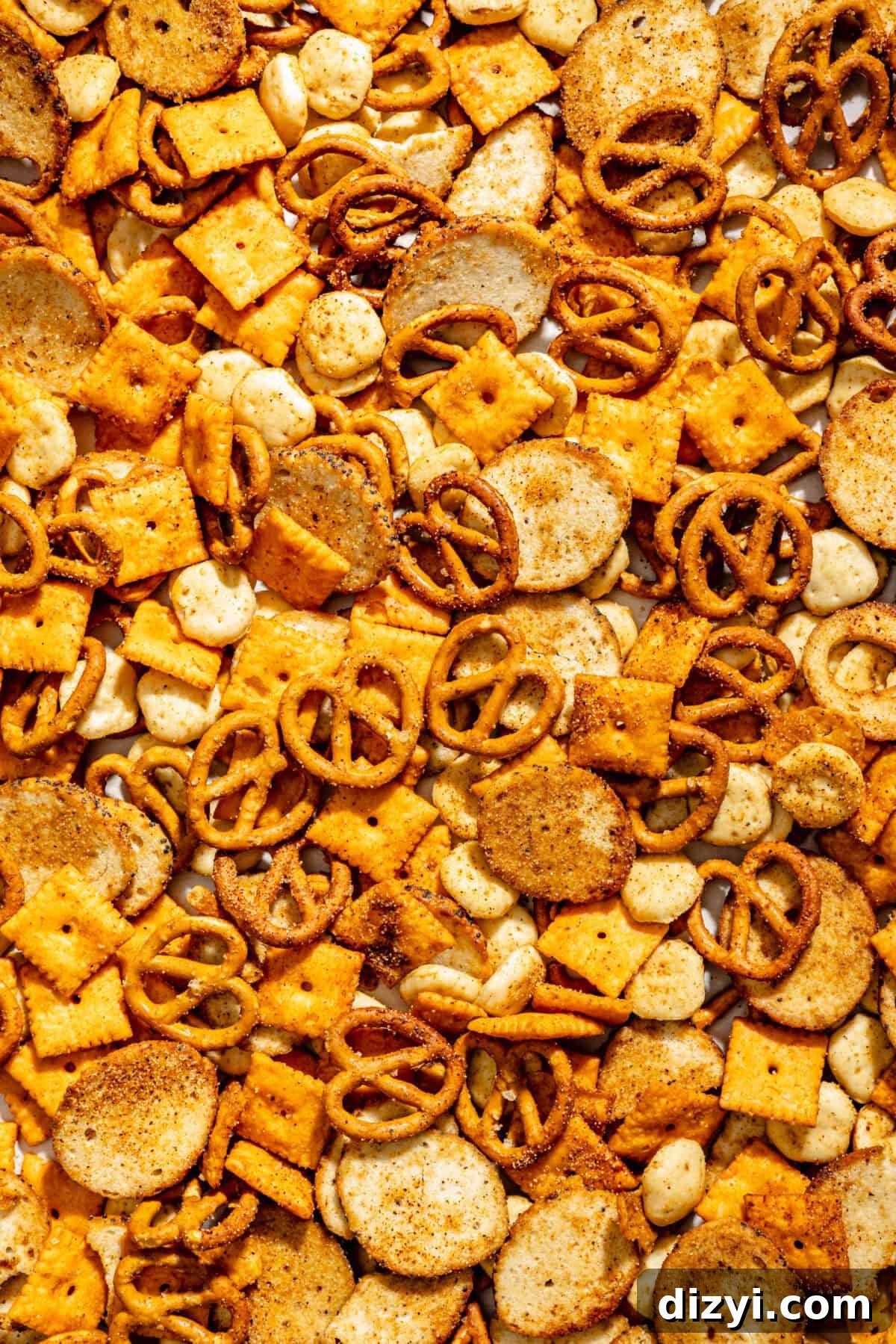 Close up of Cajun Cheddar Snack Mix on sheet pan.