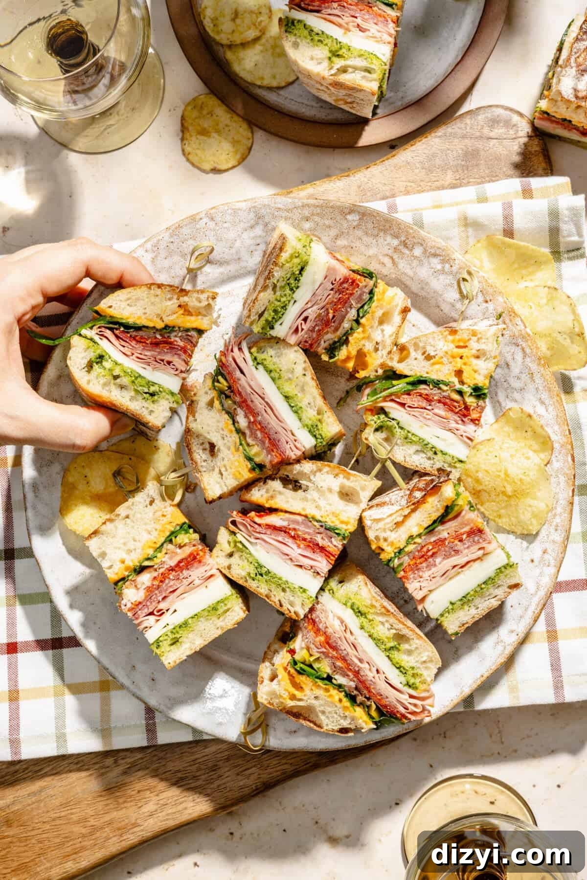 Spicy Italian Pesto Party Sandwich Recipe 2 a platter with italian party sub sandwiches
